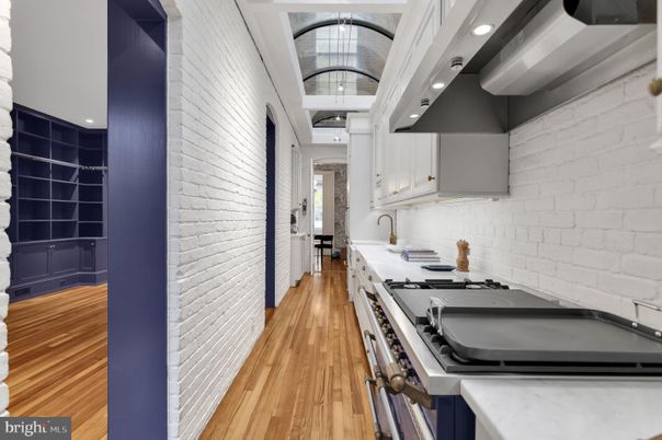 Interior, Kitchen, Recessed Lighting, Stainless Steel Appliances, Stone Walls, Wood Texture Flooring