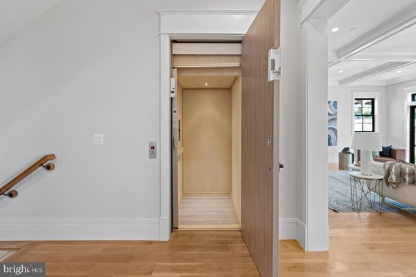 Elevator, Interior, Recessed Lighting, Wood Texture Flooring, Wooden Walls