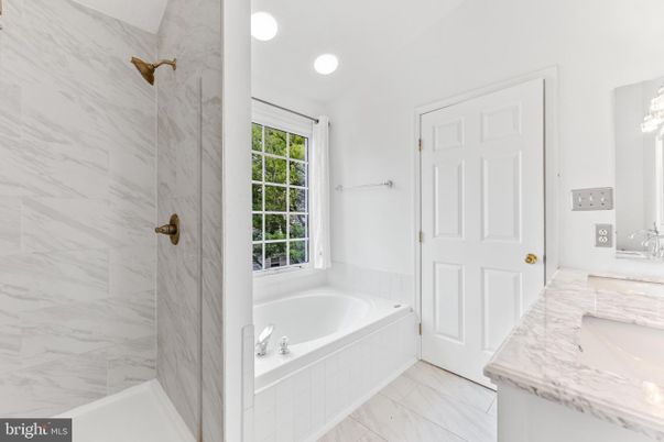 Bathroom, Dual Sink Vanities, Interior, Marble, Marble Walls, Recessed Lighting
