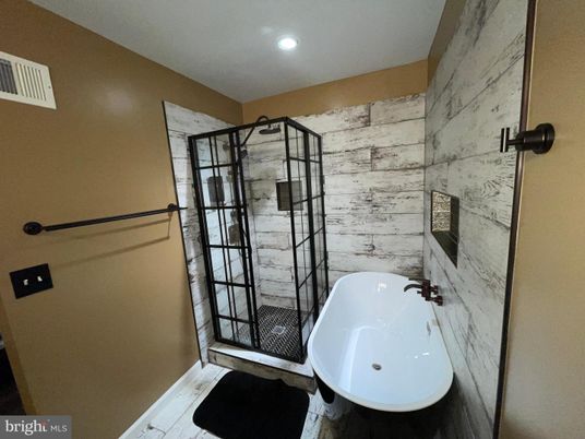 Bathroom, Free Standing Baths, Glass Shower, Interior, Marble Walls, Recessed Lighting