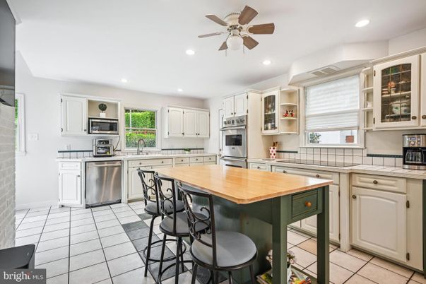 Interior, Kitchen, Recessed Lighting, Stainless Steel Appliances, Tile Countertops