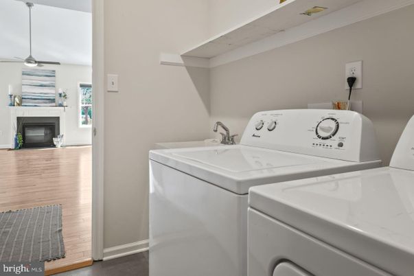 Fireplace, Interior, Pendant Lights, Washer, Wood Texture Flooring