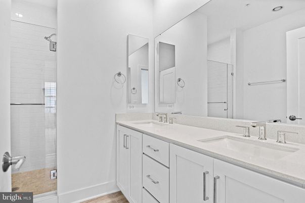 Bathroom, Dual Sink Vanities, Interior, Recessed Lighting, Wood Texture Flooring