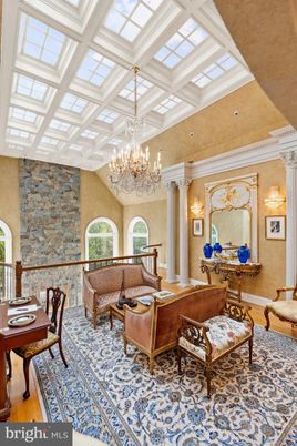 Chandelier, Interior, Living room, Recessed Lighting, Stone Walls, Wood Texture Flooring