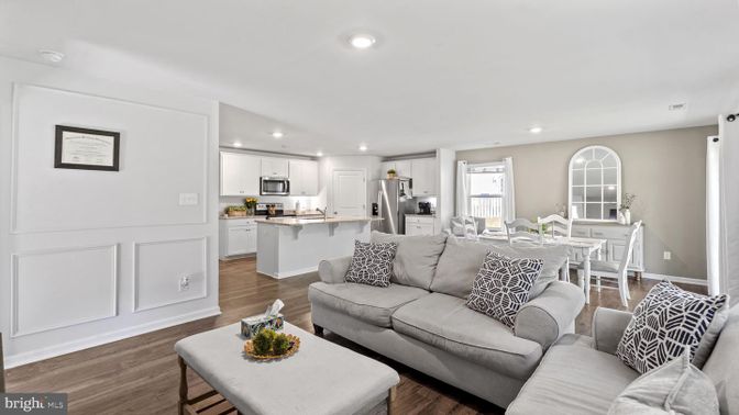Dining room, Interior, Kitchen, Living room, Recessed Lighting, Stainless Steel Appliances, Wood Texture Flooring