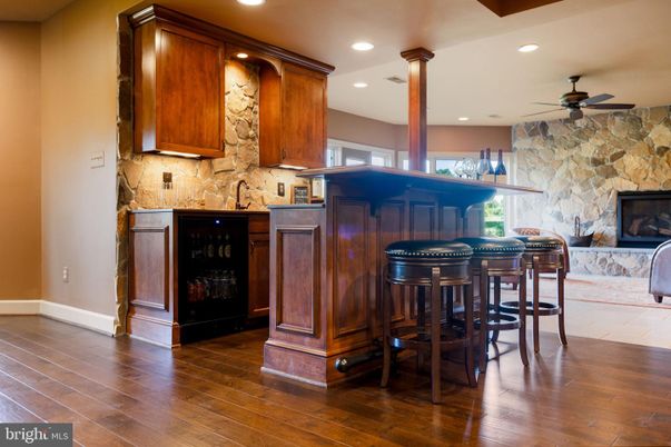 Fireplace, Interior, Recessed Lighting, Stone Walls, Wood Texture Flooring