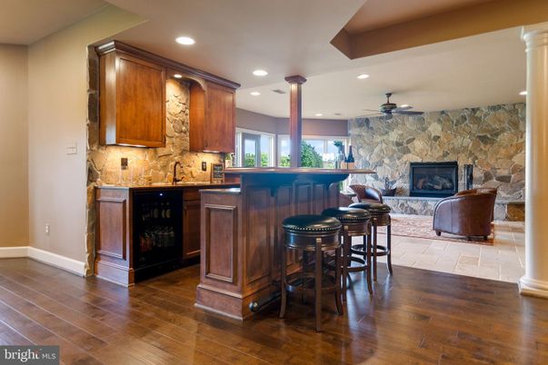 Fireplace, Interior, Recessed Lighting, Stone Walls, Wood Texture Flooring