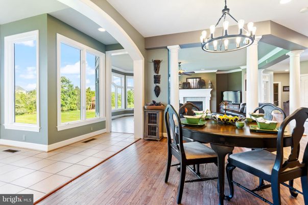 Chandelier, Dining room, Fireplace, Interior, Recessed Lighting, Wood Texture Flooring
