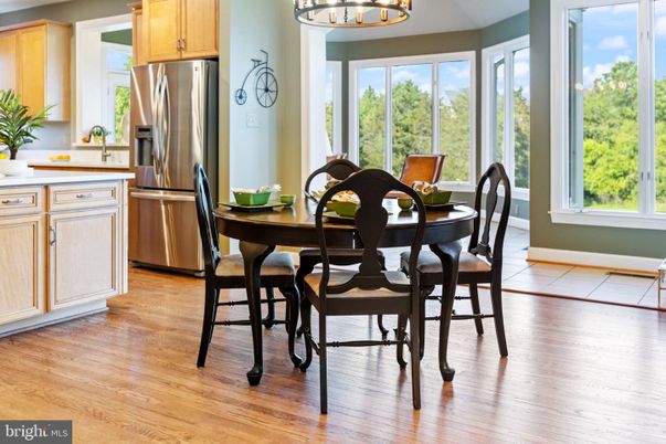 Chandelier, Dining room, Interior, Kitchen, Stainless Steel Appliances, Wood Texture Flooring