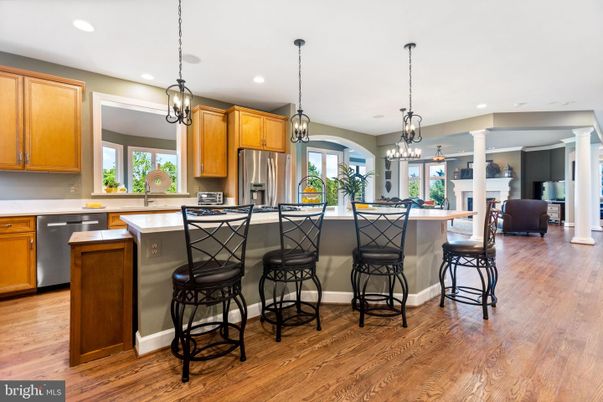 Fireplace, Interior, Kitchen, Pendant Lights, Recessed Lighting, Stainless Steel Appliances, Wood Texture Flooring