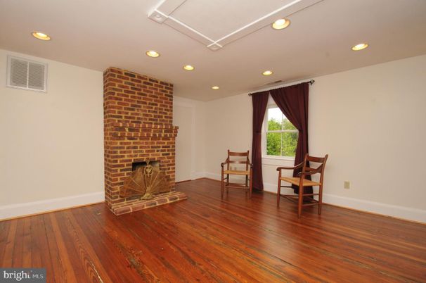 Fireplace, Interior, Recessed Lighting, Stone Walls, Wood Texture Flooring