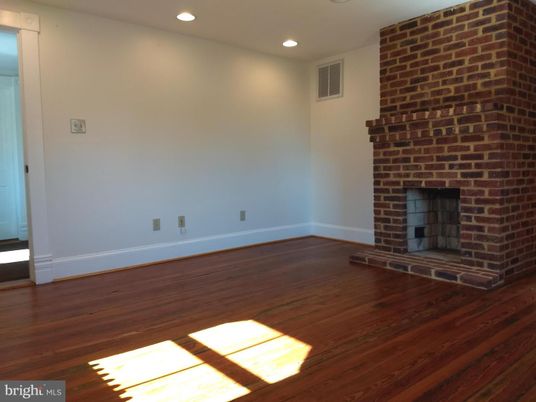 Empty room, Fireplace, Interior, Recessed Lighting, Stone Walls, Wood Texture Flooring