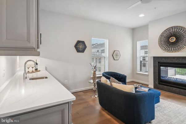 Fireplace, Interior, Kitchen, Recessed Lighting, Wood Texture Flooring