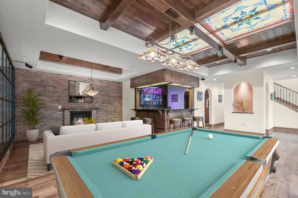 Billiard Table, Fireplace, Game Room, Interior, Living room, Pendant Lights, Recessed Lighting, Stone Walls, Wooden Beams, Wooden Ceilings, Wood Texture Flooring