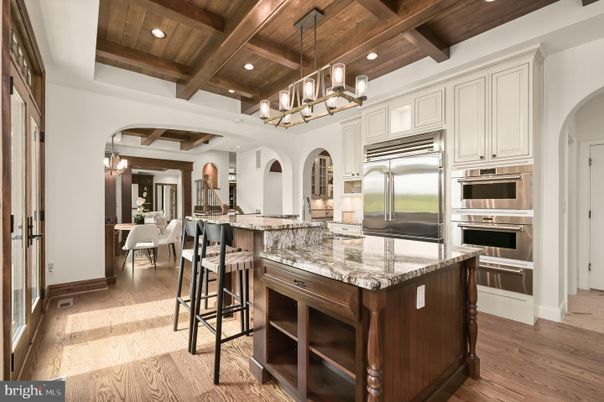 Chandelier, Dining room, Interior, Kitchen, Pendant Lights, Recessed Lighting, Stainless Steel Appliances, Wooden Beams, Wooden Ceilings, Wood Texture Flooring