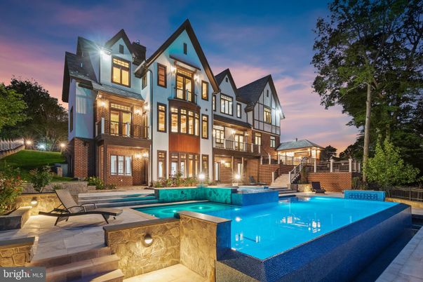 Exterior, Facade, Brick Facade, Pool, Tudor Revival