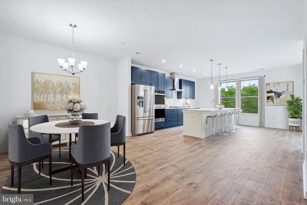 Chandelier, Dining room, Interior, Kitchen, Pendant Lights, Recessed Lighting, Stainless Steel Appliances, Wood Texture Flooring