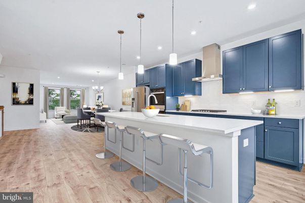 Dining room, Interior, Kitchen, Living room, Pendant Lights, Recessed Lighting, Stainless Steel Appliances, Wood Texture Flooring