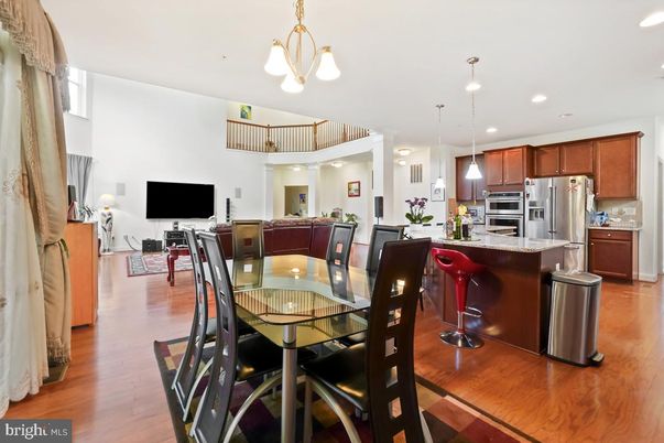 Dining room, Interior, Kitchen, Living room, Pendant Lights, Recessed Lighting, Stainless Steel Appliances, Wood Texture Flooring