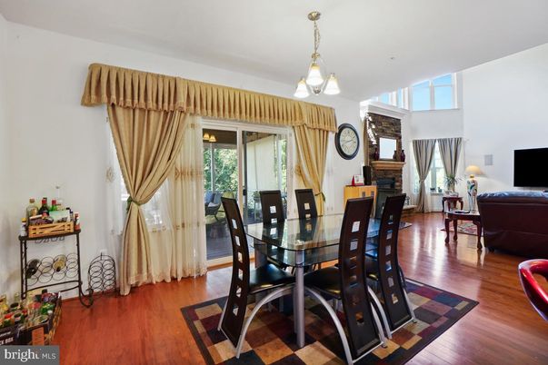 Chandelier, Dining room, Fireplace, Interior, Wood Texture Flooring