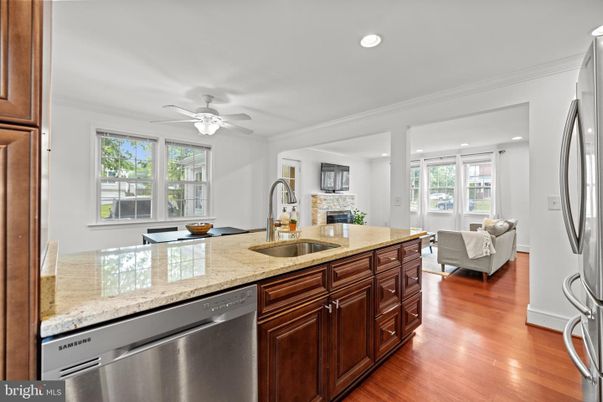 Fireplace, Interior, Kitchen, Living room, Recessed Lighting, Wood Texture Flooring