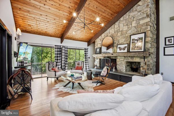 Fireplace, Interior, Living room, Recessed Lighting, Stone Walls, Wooden Beams, Wooden Ceilings, Wood Texture Flooring