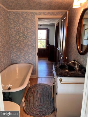 Bathroom, Dual Sink Vanities, Free Standing Baths, Interior, Wood Texture Flooring
