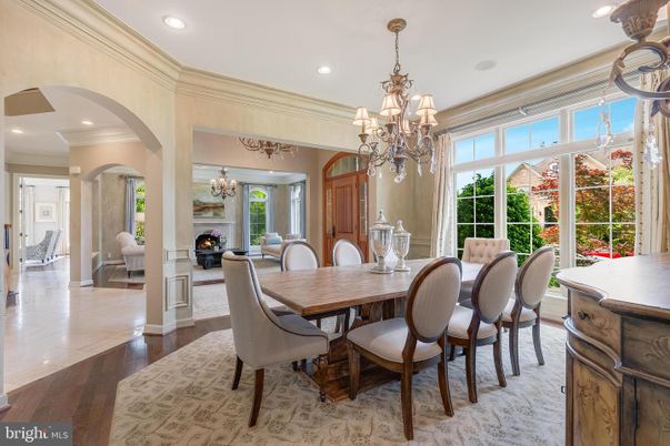 Chandelier, Dining room, Fireplace, Interior, Living room, Recessed Lighting, Wood Texture Flooring