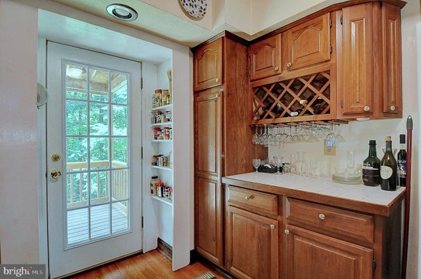 Interior, Kitchen, Tile Countertops, Wood Texture Flooring