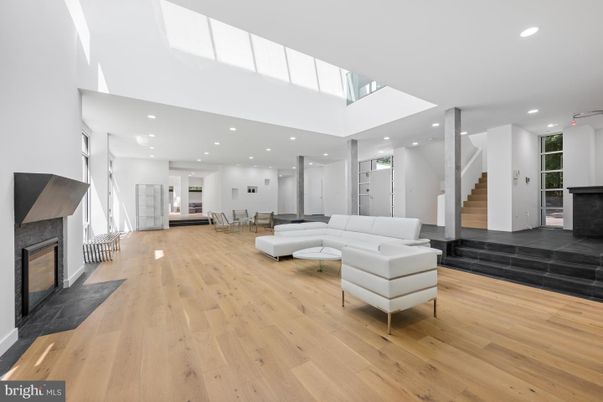 Dining room, Fireplace, Interior, Living room, Recessed Lighting, Wood Texture Flooring