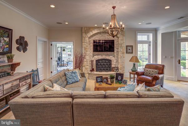 Chandelier, Fireplace, Interior, Living room, Recessed Lighting, Stone Walls