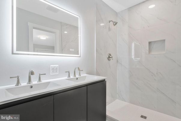 Bathroom, Dual Sink Vanities, Interior, Marble Walls, Recessed Lighting