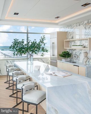 Interior, Kitchen, Marble Walls, Recessed Lighting, Water, Wood Texture Flooring