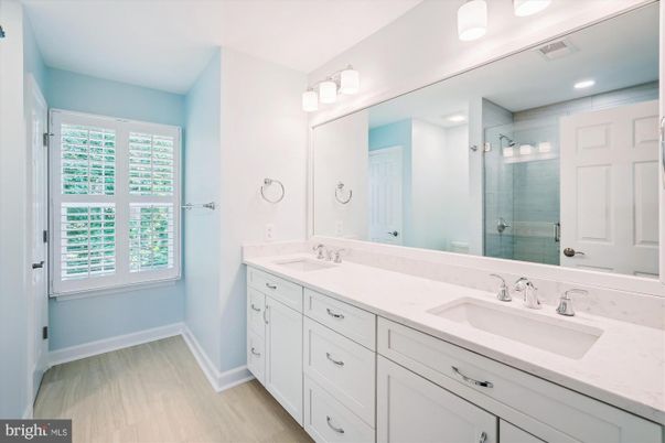 Bathroom, Dual Sink Vanities, Interior, Recessed Lighting, Wood Texture Flooring