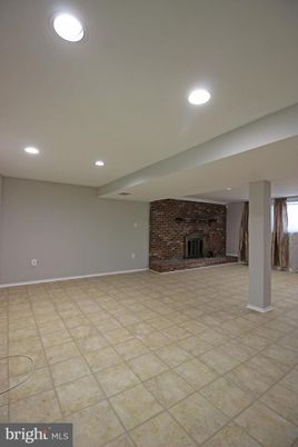 Empty room, Fireplace, Interior, Recessed Lighting, Stone Walls