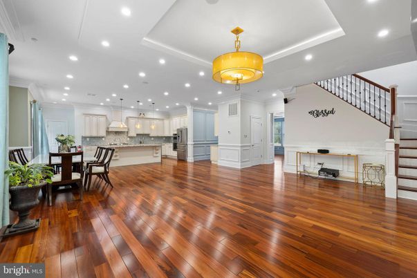 Dining room, Interior, Kitchen, Pendant Lights, Recessed Lighting, Stainless Steel Appliances, Wood Texture Flooring