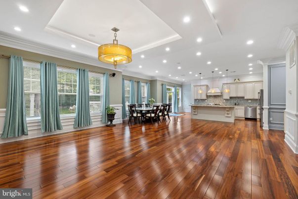 Dining room, Interior, Kitchen, Pendant Lights, Recessed Lighting, Stainless Steel Appliances, Wood Texture Flooring