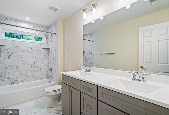 Bathroom, Dual Sink Vanities, Interior, Marble, Marble Walls, Recessed Lighting