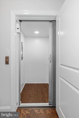 Elevator, Interior, Recessed Lighting, Wood Texture Flooring