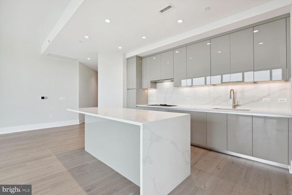 Interior, Kitchen, Marble Walls, Recessed Lighting, Wood Texture Flooring