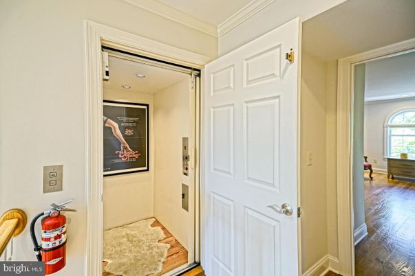 Elevator, Interior, Recessed Lighting, Wood Texture Flooring
