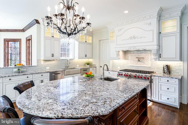 Chandelier, Dining room, Interior, Kitchen, Recessed Lighting, Stainless Steel Appliances, Wood Texture Flooring
