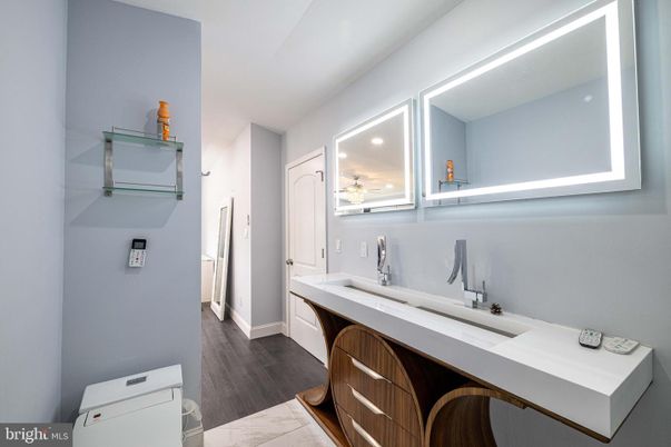 Bathroom, Dual Sink Vanities, Interior, Recessed Lighting, Wood Texture Flooring