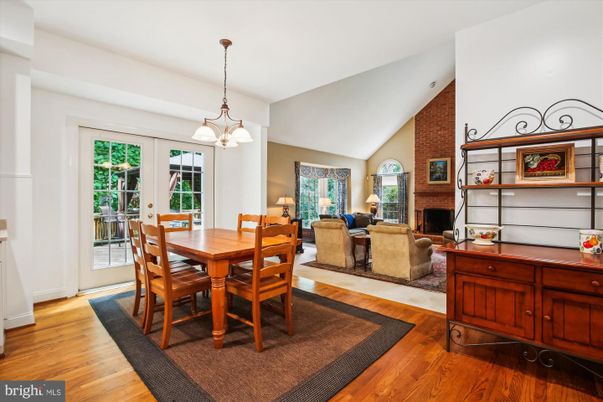Dining room, Fireplace, Interior, Living room, Pendant Lights, Stone Walls, Wood Texture Flooring