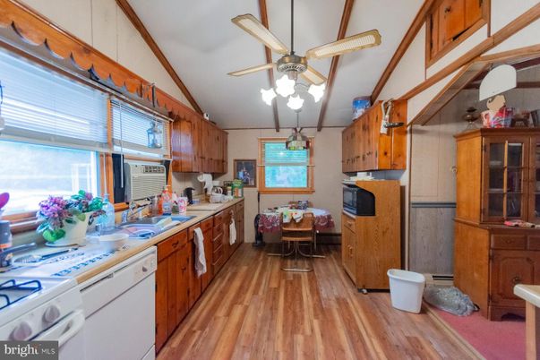 Dining room, Interior, Kitchen, Tile Countertops, Wood Texture Flooring