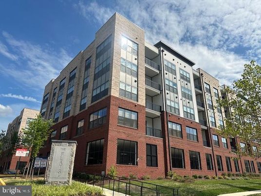 Exterior, Facade, Brick Facade, Condo Building