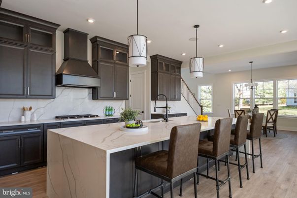 Dining room, Interior, Kitchen, Marble Walls, Pendant Lights, Recessed Lighting, Stainless Steel Appliances, Wood Texture Flooring
