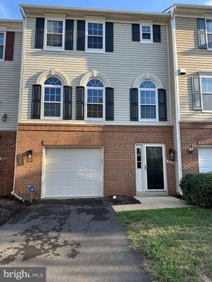Attached, Exterior, Facade, Brick Facade, Rowhouse