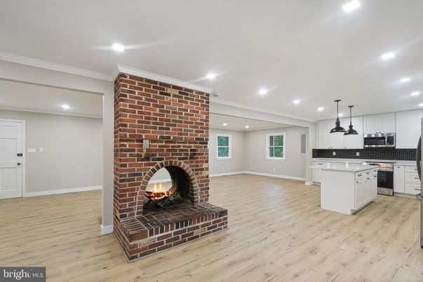 Fireplace, Interior, Kitchen, Pendant Lights, Recessed Lighting, Stone Walls, Wood Texture Flooring