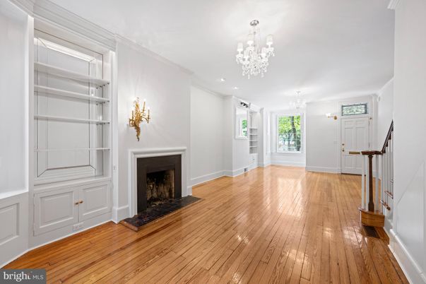 Chandelier, Empty room, Fireplace, Interior, Recessed Lighting, Wood Texture Flooring